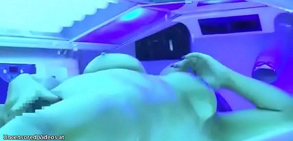  Japanese busty babe has sex in tanning bed